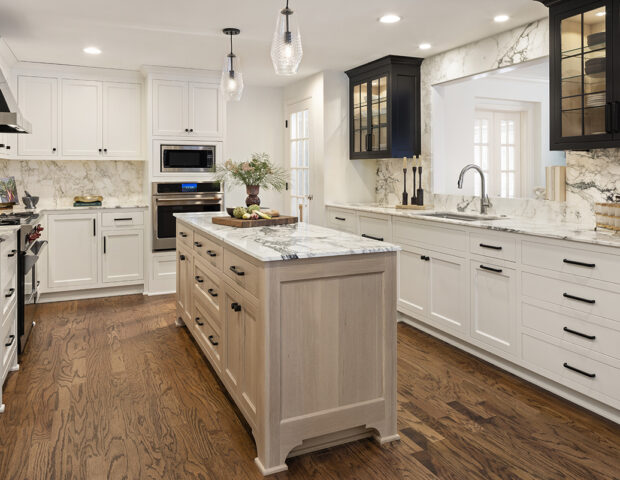 Custom oak island with marble top for new remodeled kitchen.