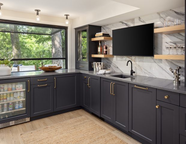 Lower level wet bar with hydraulic pass-through window.