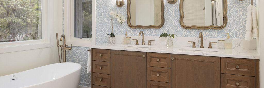 Luxurious Modern Bathroom Remodel with Freestanding Tub and Natural Wood Vanities with Marble Counters