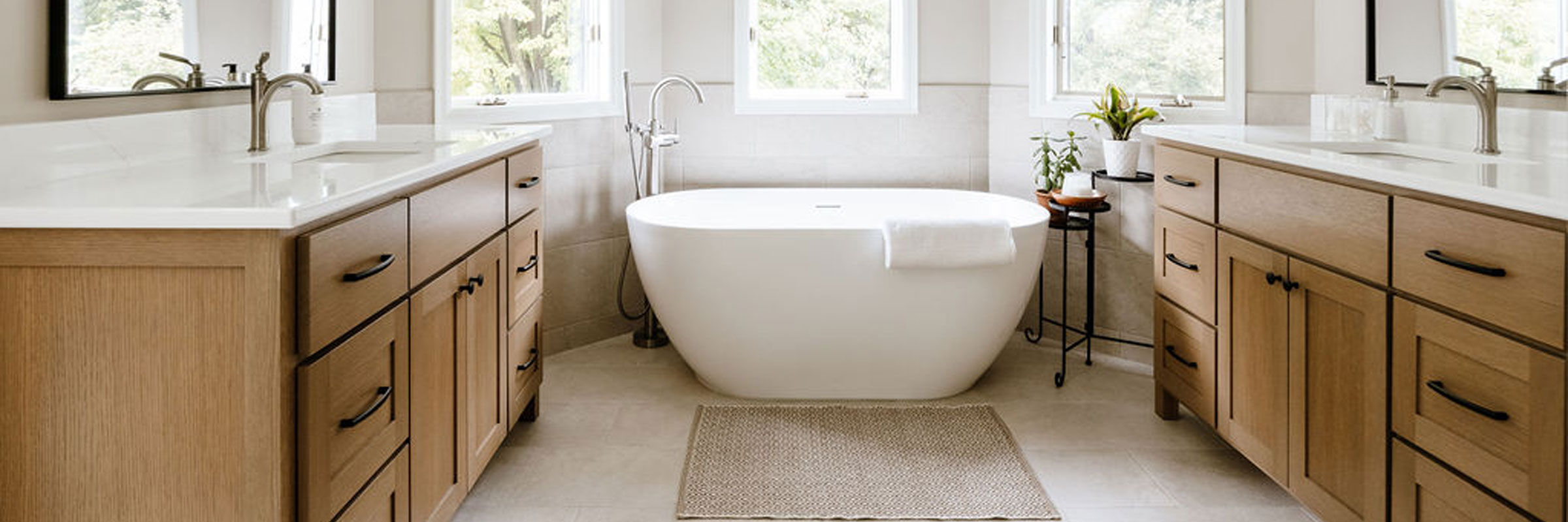 Luxurious Modern Bathroom Remodel with Freestanding Tub and Natural Wood Vanities