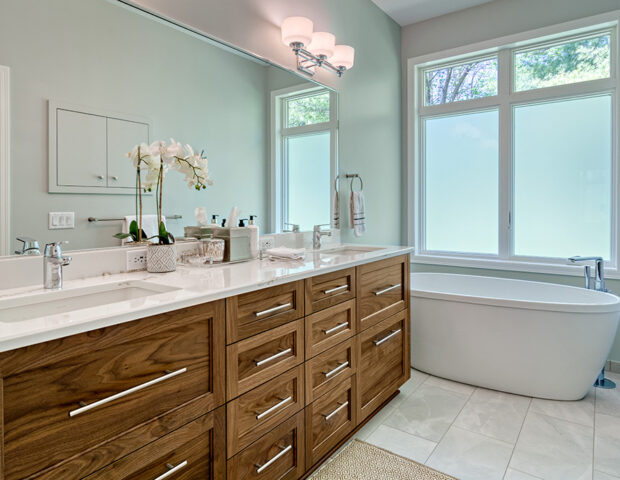 Boyer Building custom cabinetry in newly remodeled townhome master bath.