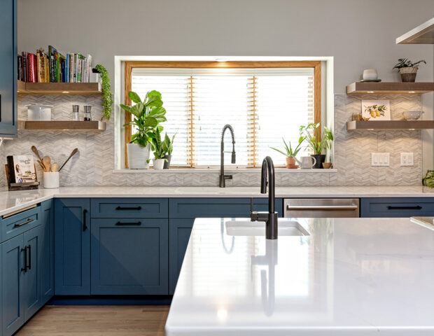 Blue remodeled kitchen with custom cabinets