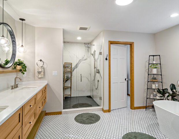 Floating double vanity and large walk in shower with separate toilet room, in newly remodeled home in Excelsior