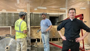 Fr. Andrei oversees another project by Boyer Building at St. Therese Church.