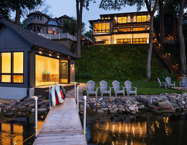 Stunning dusk shot looking up to our St Albans Bay Lake Minnetonka Boyer Building Remodel includes great boat house