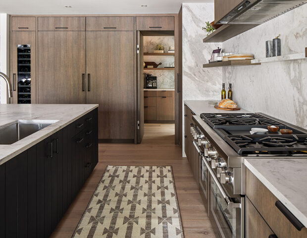 Peek a boo pantry in large kitchen in St Albans Bay Lake Minnetonka Boyer Building Remodel