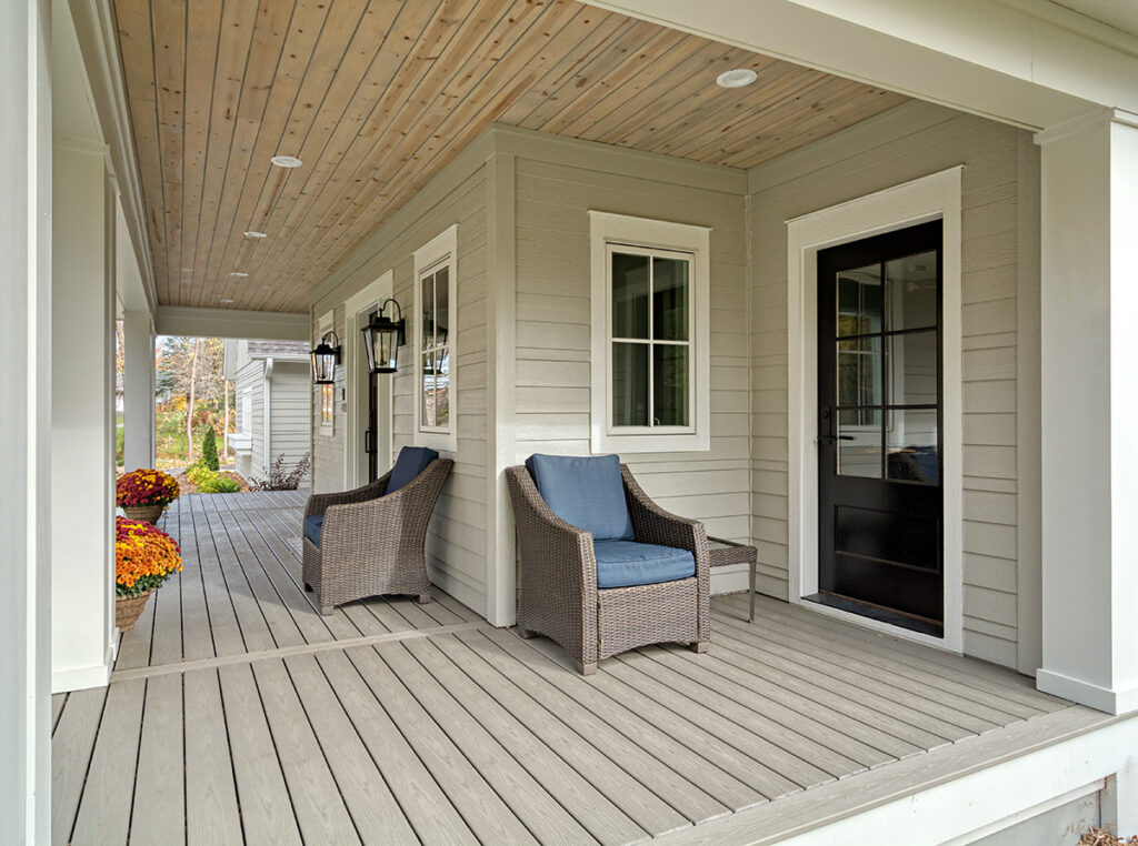 Beautiful wrap around porch on a custom Boyer Building home.