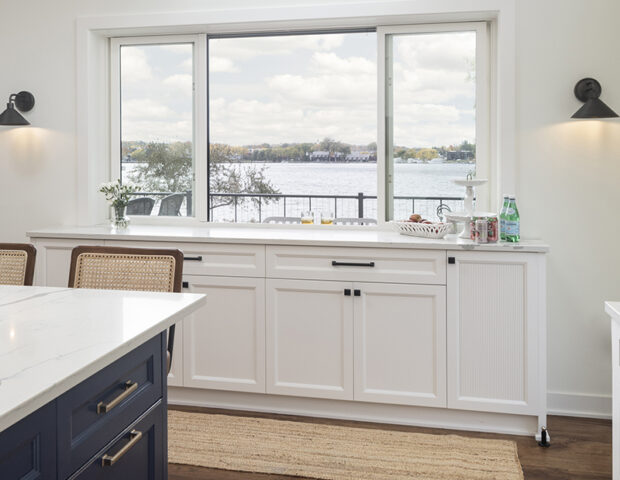 Buffet in Kitchen remodeled with a pass through window for outside bar.