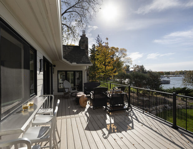 New deck with treks and added outside bar stand near pass through window.