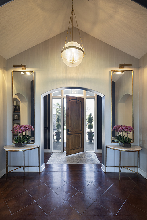 This beautiful entry to our Boyer Building project has been wallpaper for a luxury feel.