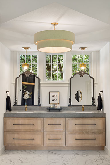 Stunning vanity in primary bath with large format tile floor.