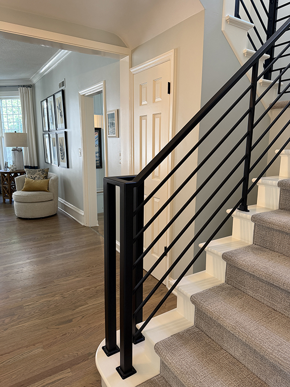 Cottagewood home gets a modern update to is railing and bathroom.