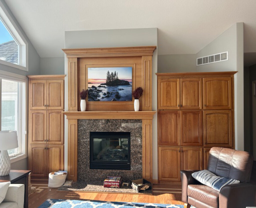 Before photo of Eden Prairie fireplace surround in oak.