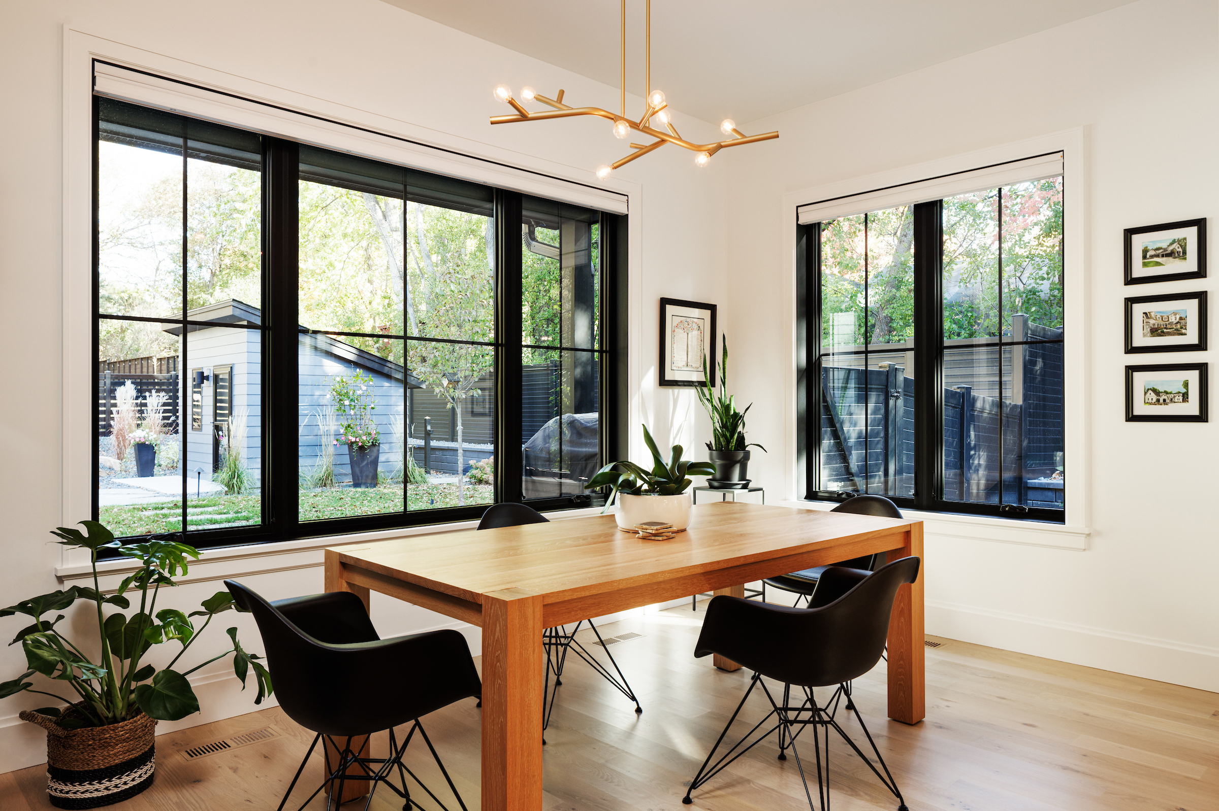 Small dining space - close to the large open kitchen. Black clad windows over look the spacious back yard and screened porch.